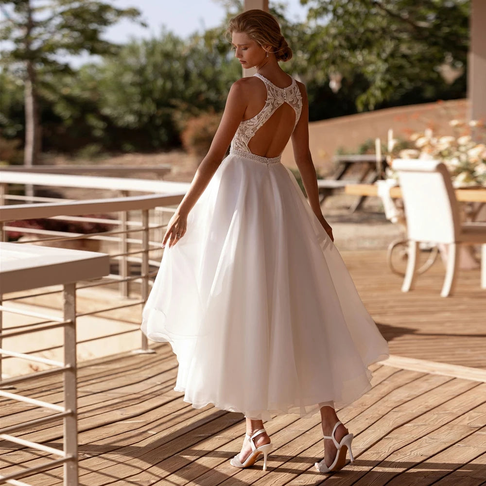 Customized Classic O Neck Wedding Dresses Sleeveless Applique Lace Bridal Grown Cut Out Back Tea Length A Line Vestidos De Novia